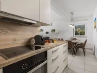 Недвижимость Трехкомнатная квартира в центре Опатии: 16