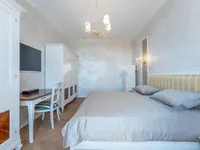 Недвижимость Трёхкомнатная квартира в центре Опатии: 12