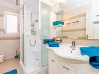 Недвижимость Четырехкомнатная квартира в центре Опатии: 11