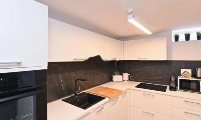 Недвижимость Четырёхкомнатная квартира в центре Опатии: 31