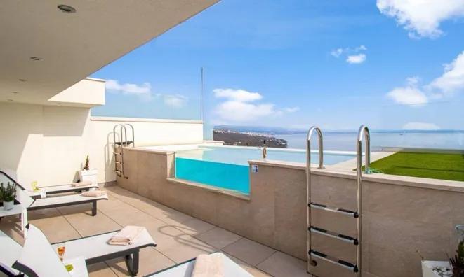 Недвижимость Многоквартирный дом Побри: 3