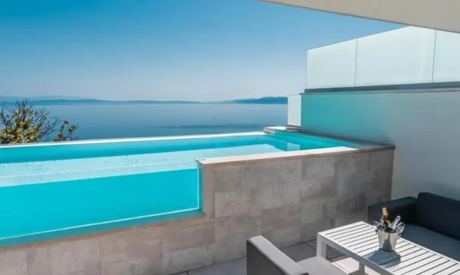 Недвижимость Многоквартирный дом в Опатии: 6